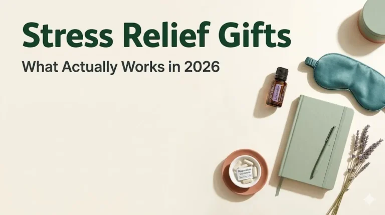 Flat-lay of stress relief gifts including lavender oil, weighted eye mask, journal, and supplements on cream background.